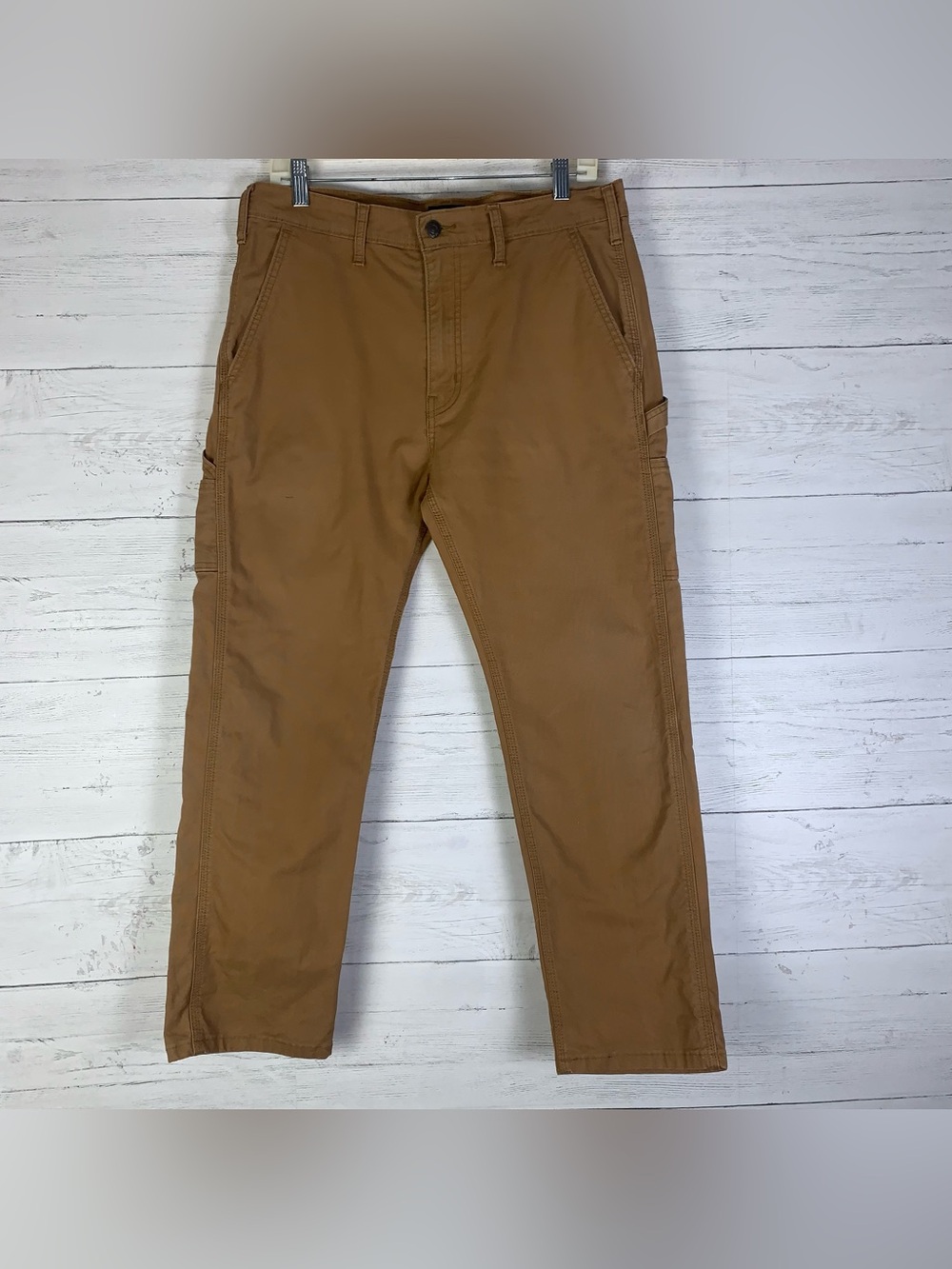 Levis khaki workwear carpenter pants mens size 33X30 (measured 33X27)